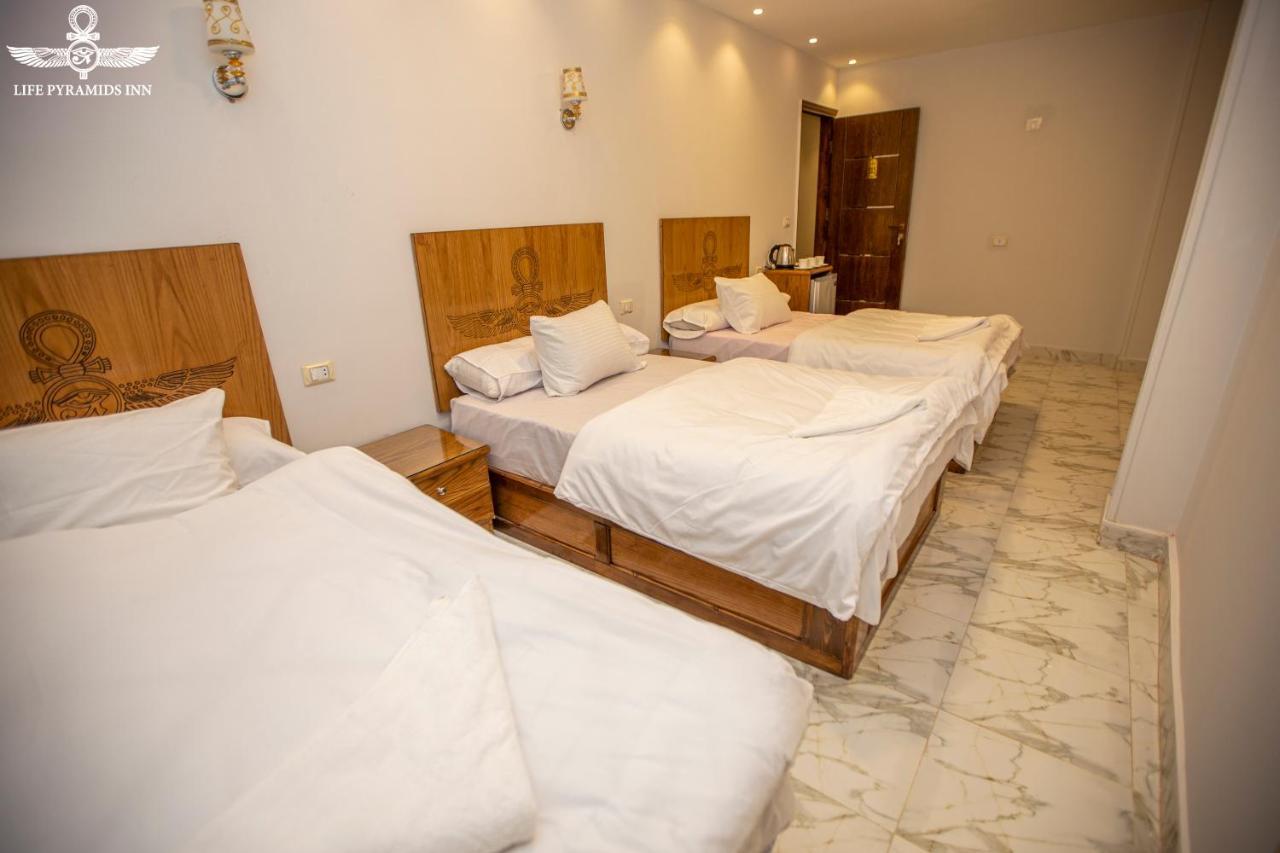 Life Pyramids Inn Kafrat al Jabal Exterior photo