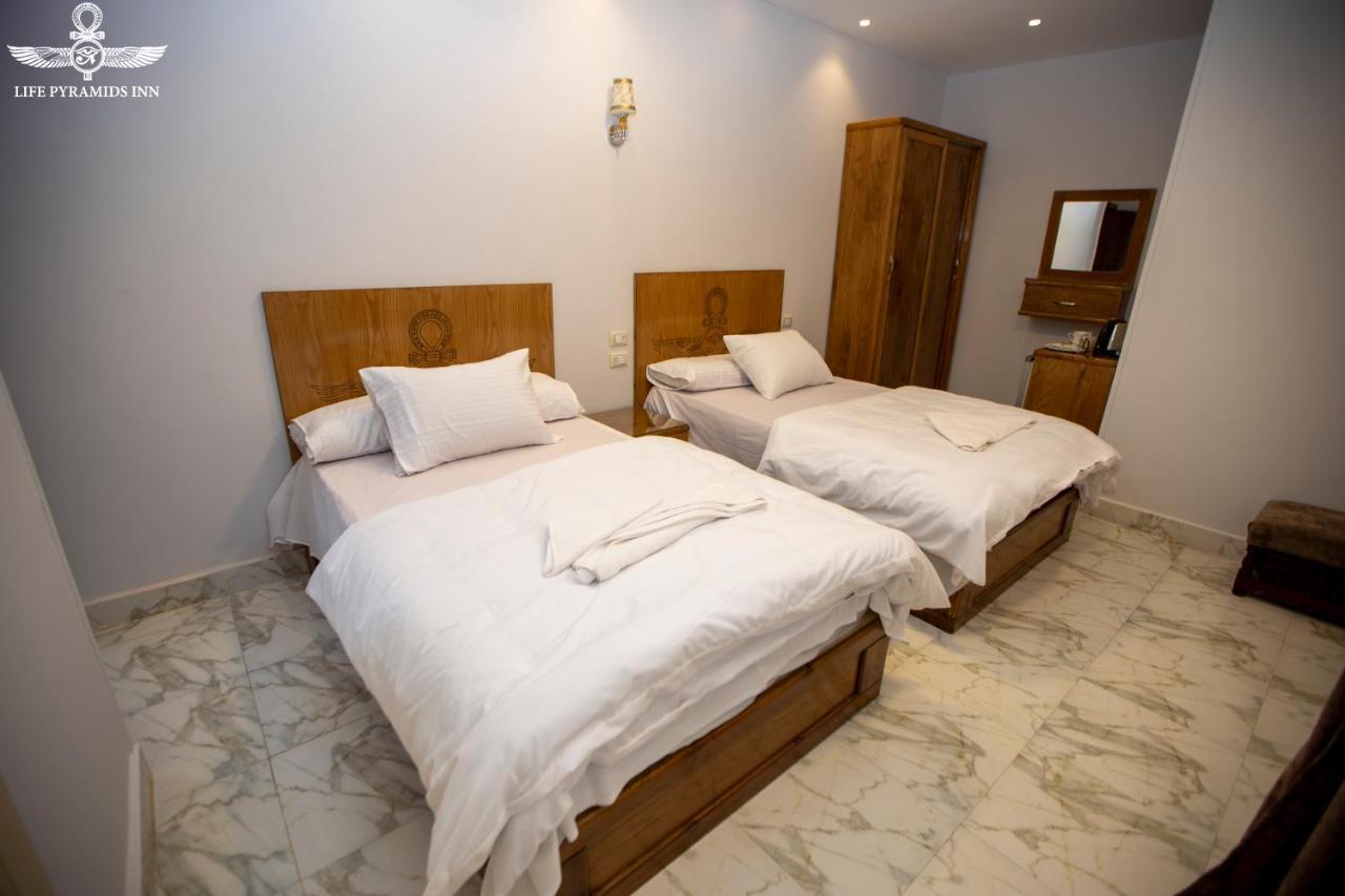 Life Pyramids Inn Kafrat al Jabal Exterior photo